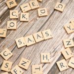 scrabble-letters-spelling-saas-on-a-wooden-tabl